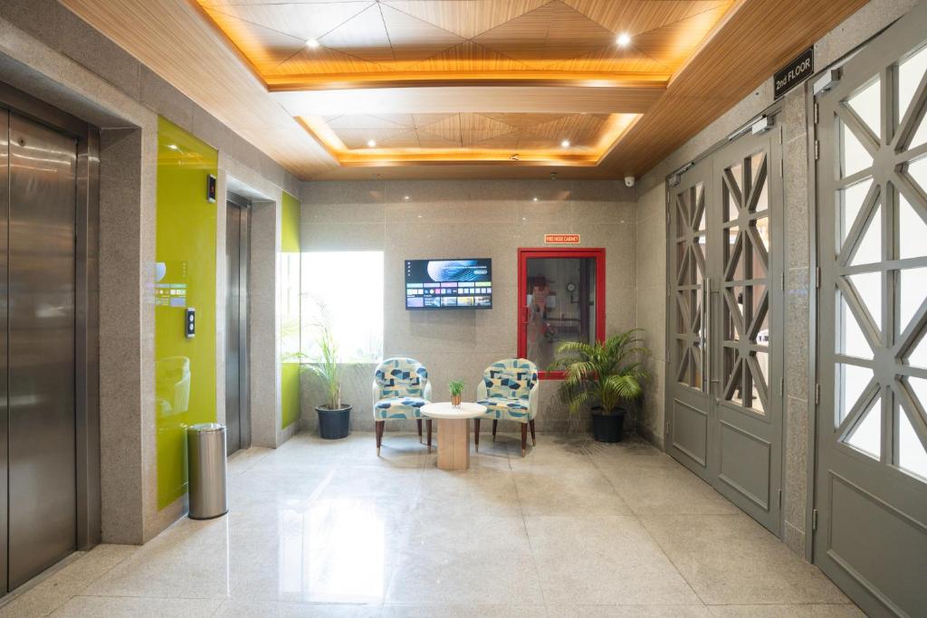 TV a/nebo společenská místnost v ubytování AR Suites KLJ Square