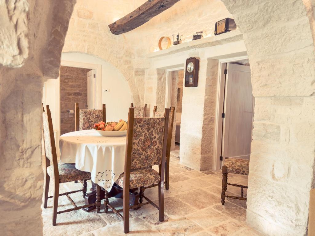 Posezení v ubytování Profumi del Melograno Trulli Resort