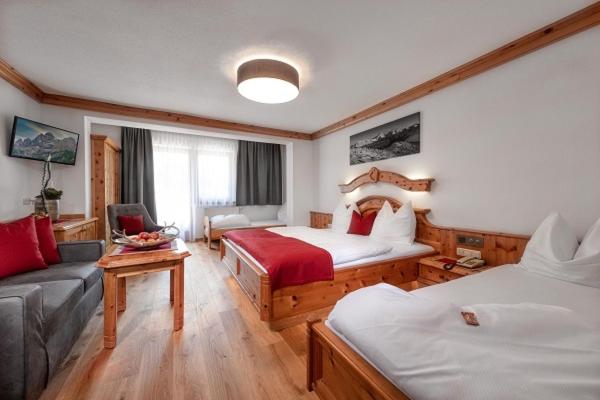 Postel nebo postele na pokoji v ubytování Hotel Hubertushof