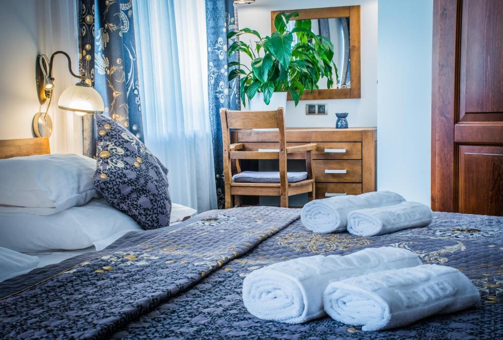 Łóżko lub łóżka w pokoju w obiekcie Hotel Friuli