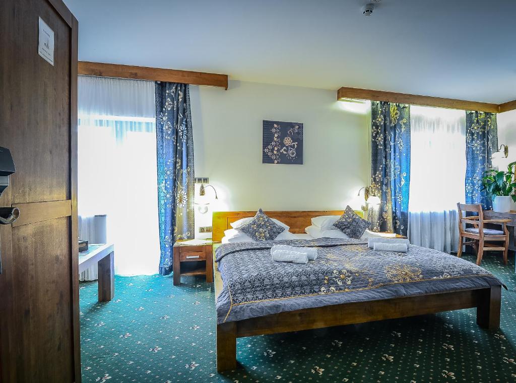 Łóżko lub łóżka w pokoju w obiekcie Hotel Friuli