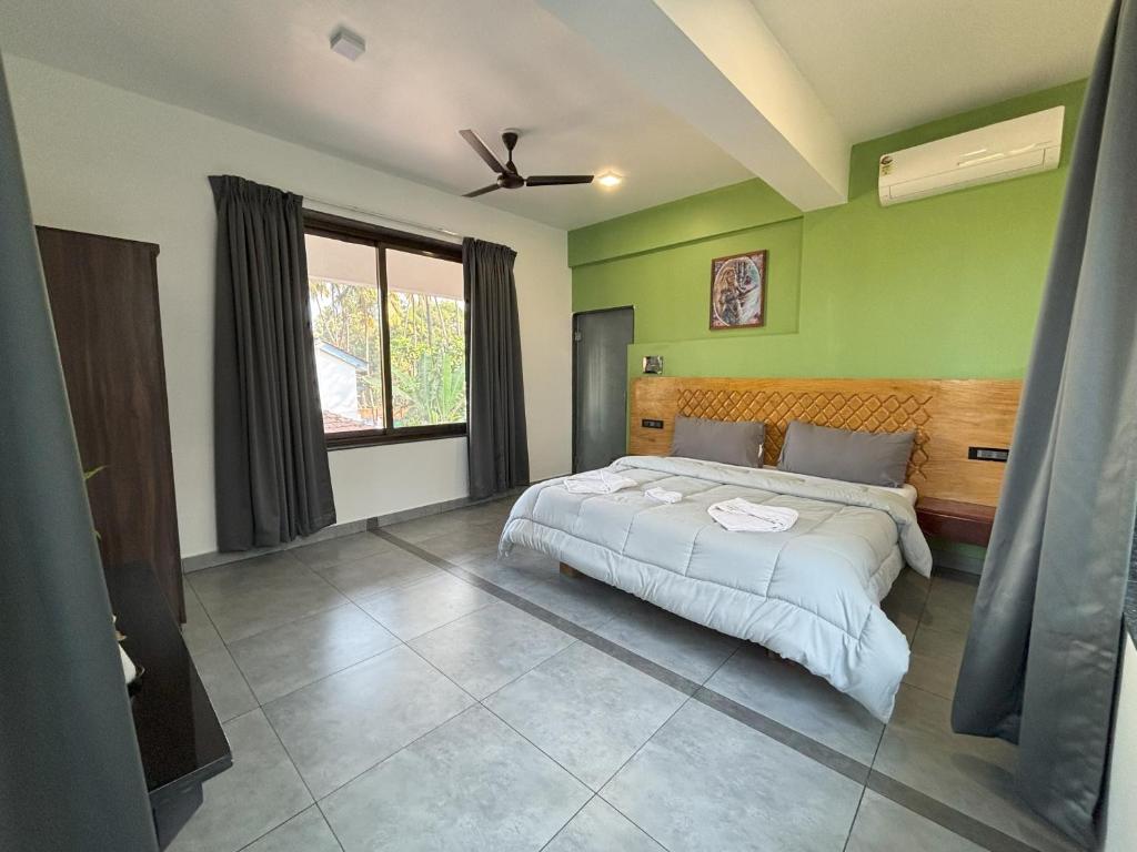 Vuode tai vuoteita majoituspaikassa Fusion Home