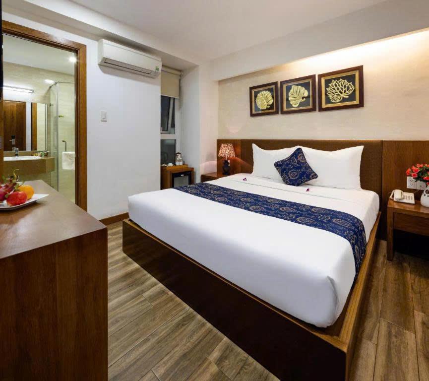 Postel nebo postele na pokoji v ubytování Sophia Sky Hotel