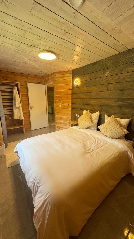 Postel nebo postele na pokoji v ubytování Gîte cosy au cœur de la nature