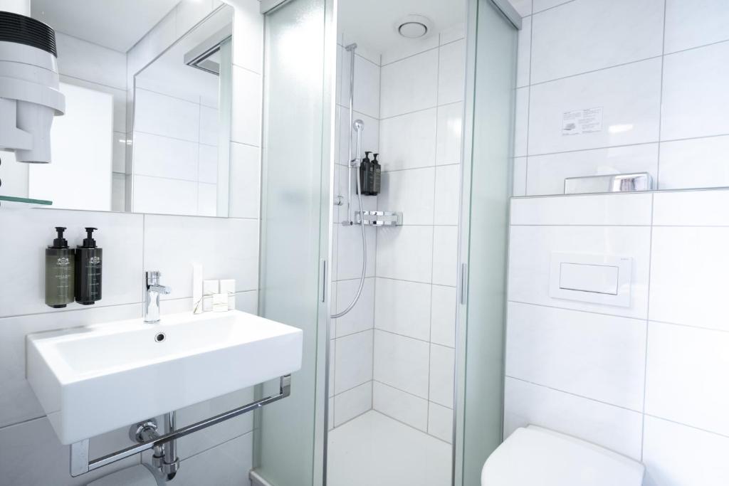 Koupelna v ubytování Hotel Royal Luzern