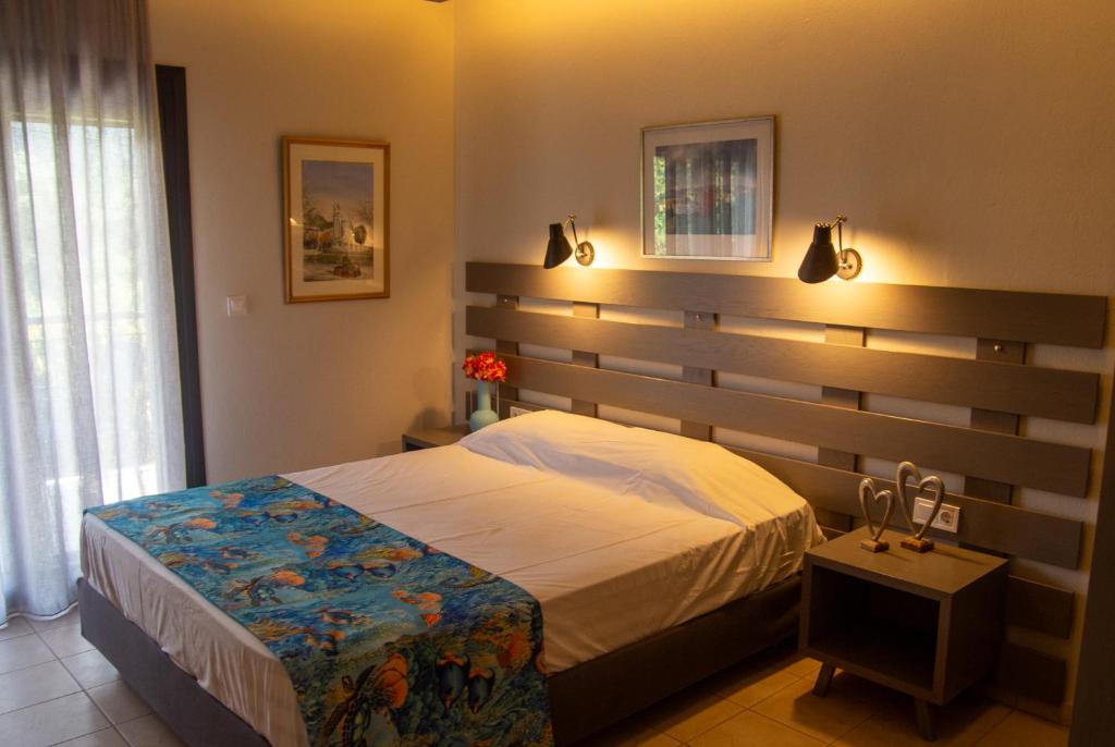 Posteľ alebo postele v izbe v ubytovaní Aliston Hotel Thassos