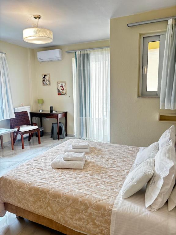 Postel nebo postele na pokoji v ubytování La maisonnette AKRO