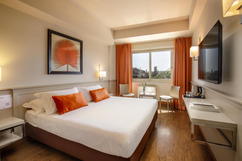 TV a/nebo společenská místnost v ubytování Grand Hotel Fleming by OMNIA hotels