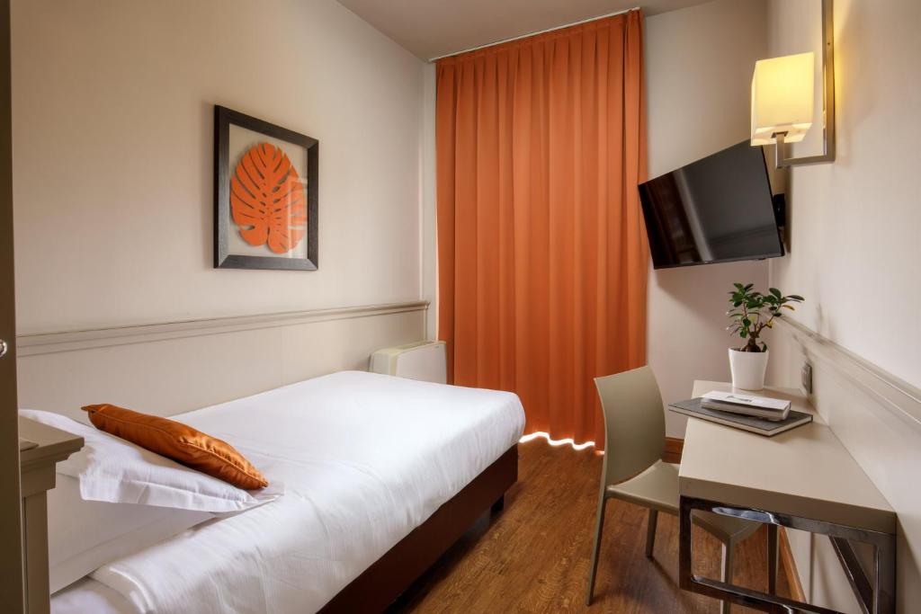 TV a/nebo společenská místnost v ubytování Grand Hotel Fleming by OMNIA hotels