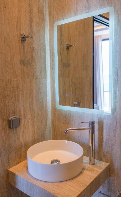 Koupelna v ubytování Poseidon Hotel