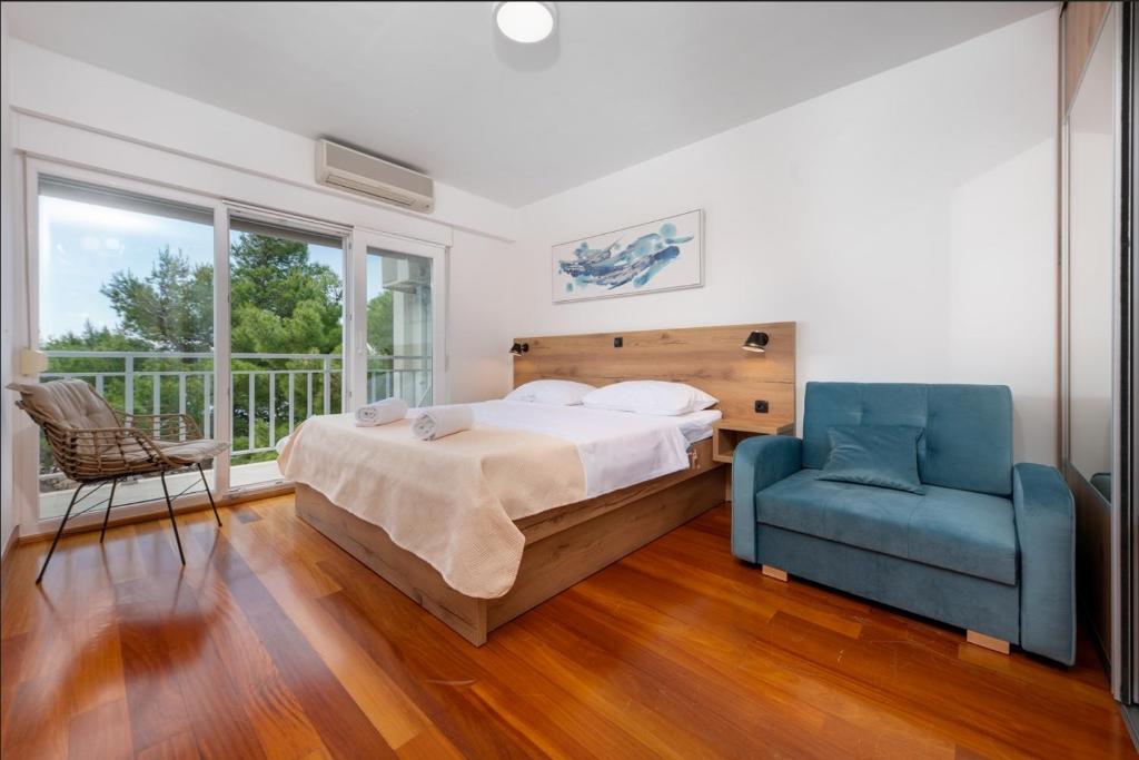 Posteľ alebo postele v izbe v ubytovaní Apartman Zdravka