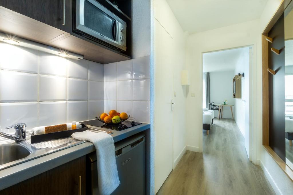 Koupelna v ubytování City Résidence Tours