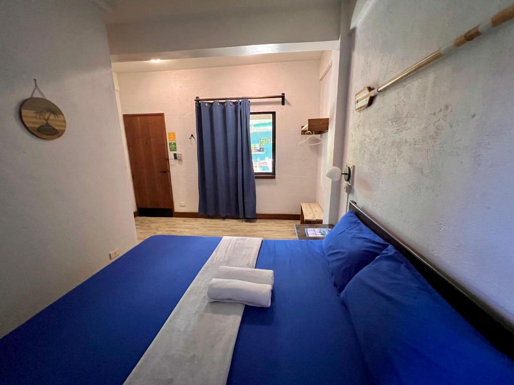 Postel nebo postele na pokoji v ubytování Island Lyfe Adventures