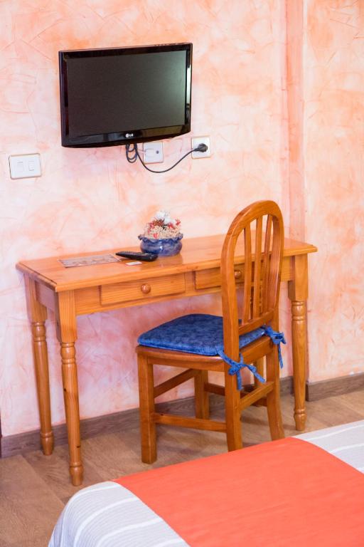 TV a/nebo společenská místnost v ubytování Sorrosal