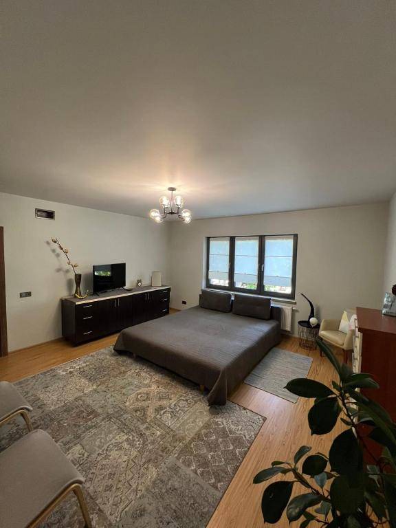 Postel nebo postele na pokoji v ubytování Tulipan Hotel Aquapark