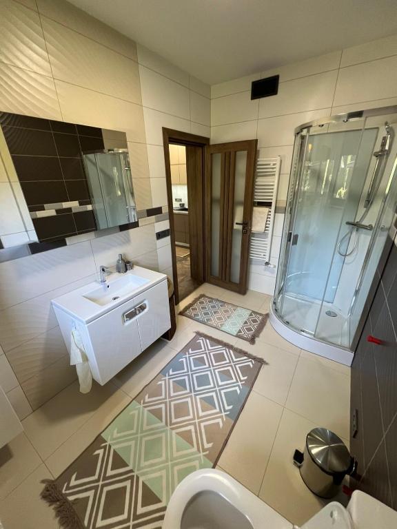 Koupelna v ubytování Tulipan Hotel Aquapark