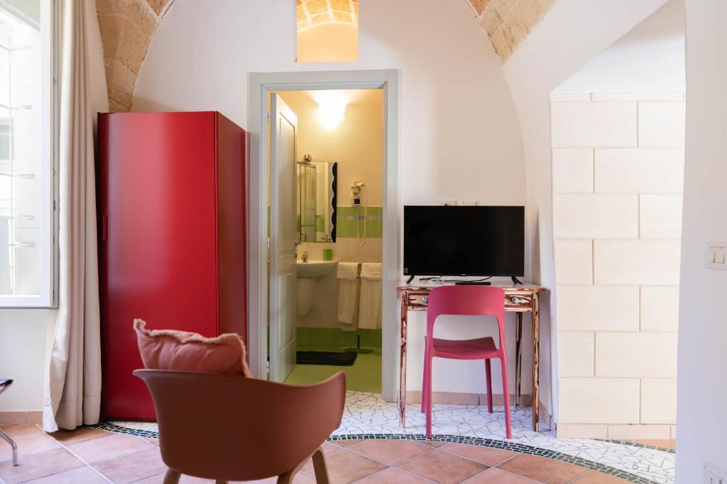 TV a/nebo společenská místnost v ubytování B&B Corte dei Memoli di Margiotta Giuseppina