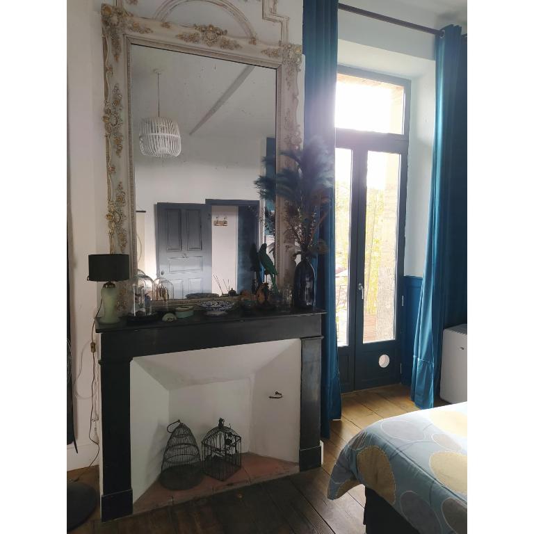 Postel nebo postele na pokoji v ubytování Le Petit Couvent