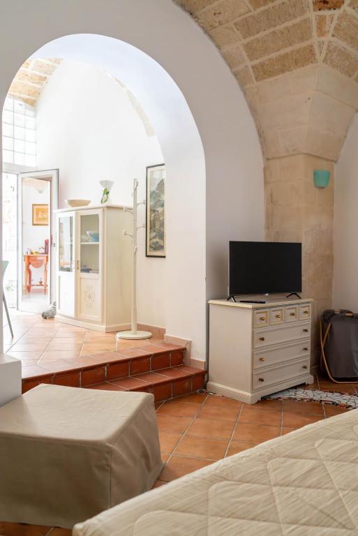 TV a/nebo společenská místnost v ubytování B&B Corte dei Memoli di Margiotta Giuseppina