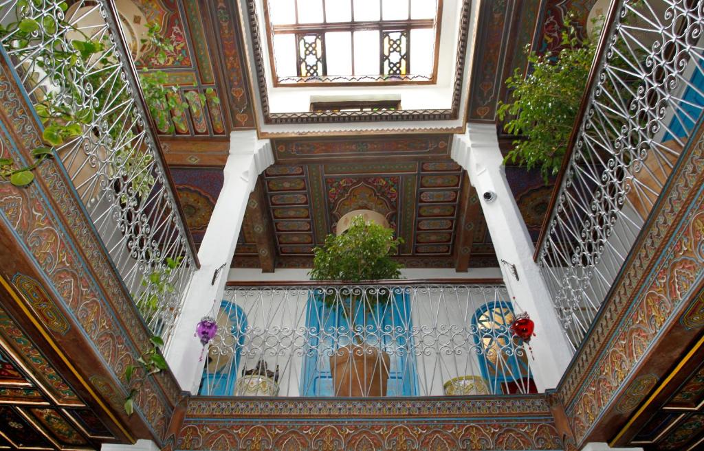 an overhead view of a staircase in a building at Riad Cherifa in Chefchaouene
