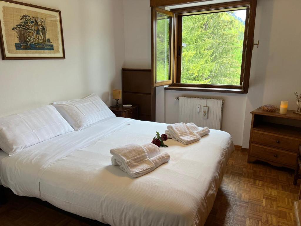 Postel nebo postele na pokoji v ubytování Menz campiglio