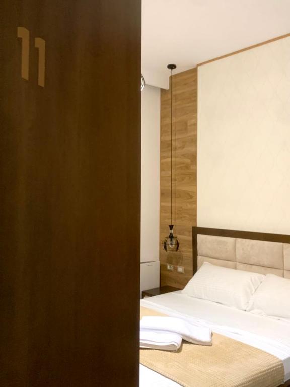 Postel nebo postele na pokoji v ubytování Triena Rooms