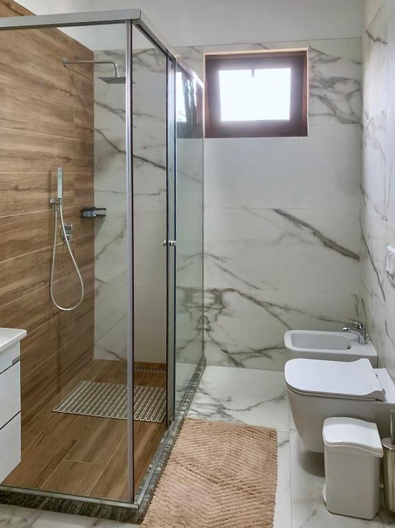 Koupelna v ubytování Triena Rooms