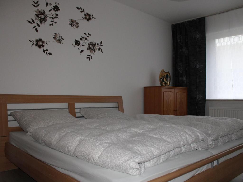Postel nebo postele na pokoji v ubytování Ferienwohnung Möhneblick