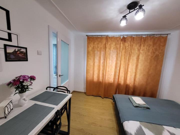 Postel nebo postele na pokoji v ubytování Tulipan Hotel Aquapark