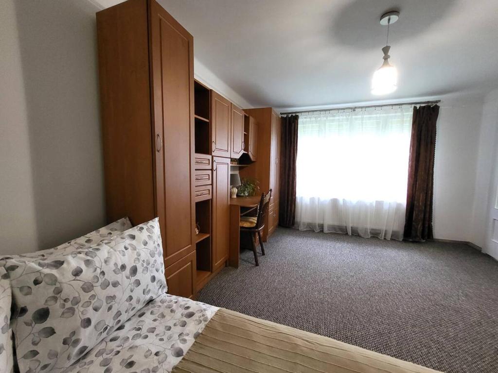 Postel nebo postele na pokoji v ubytování Tulipan Hotel Aquapark