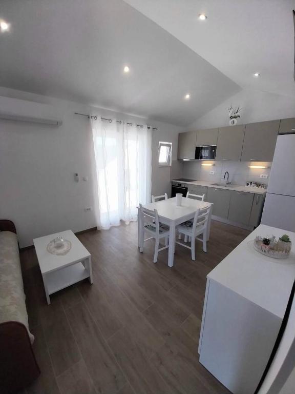 Kuchyň nebo kuchyňský kout v ubytování Apartments Zlata