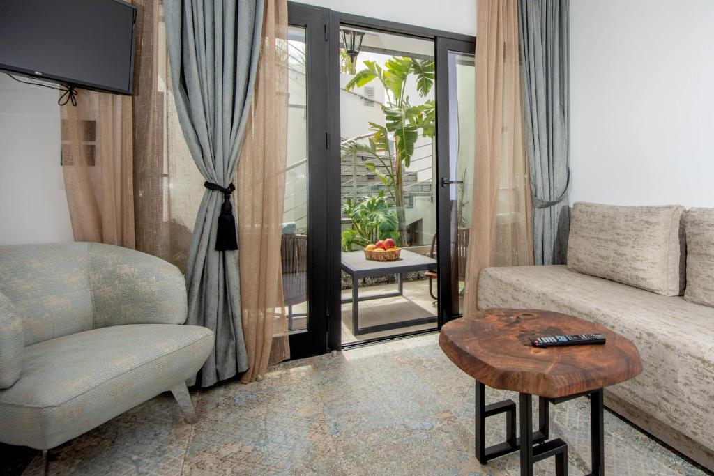 Posezení v ubytování Beach Walk Luxury Suites