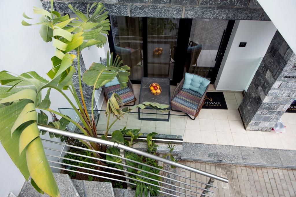 Balkón nebo terasa v ubytování Beach Walk Luxury Suites