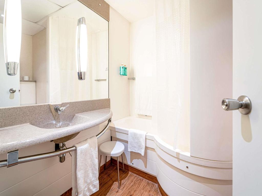 Koupelna v ubytování Novotel Roma Est