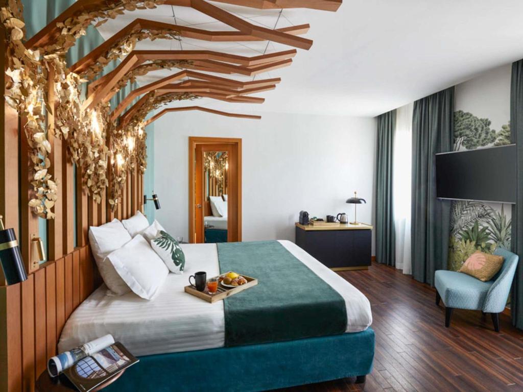 Posteľ alebo postele v izbe v ubytovaní Hotel Mercure Roma Corso Trieste