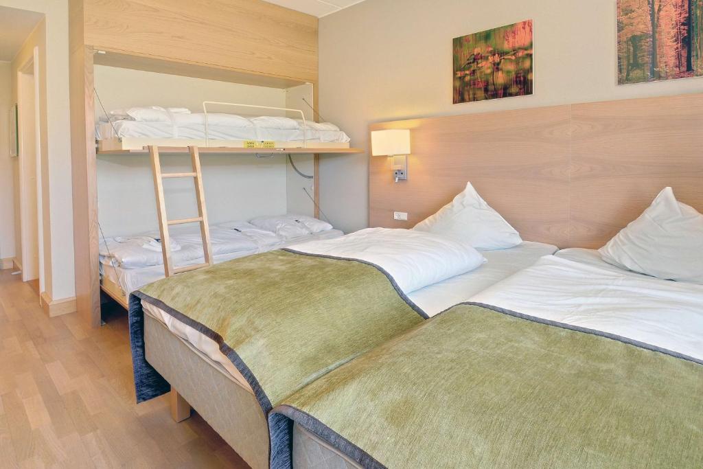 Postel nebo postele na pokoji v ubytování Scandic Sønderborg