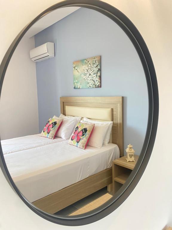 Postel nebo postele na pokoji v ubytování Paradiso Hotel Sea View and Pool Suites Ipsos Corfu