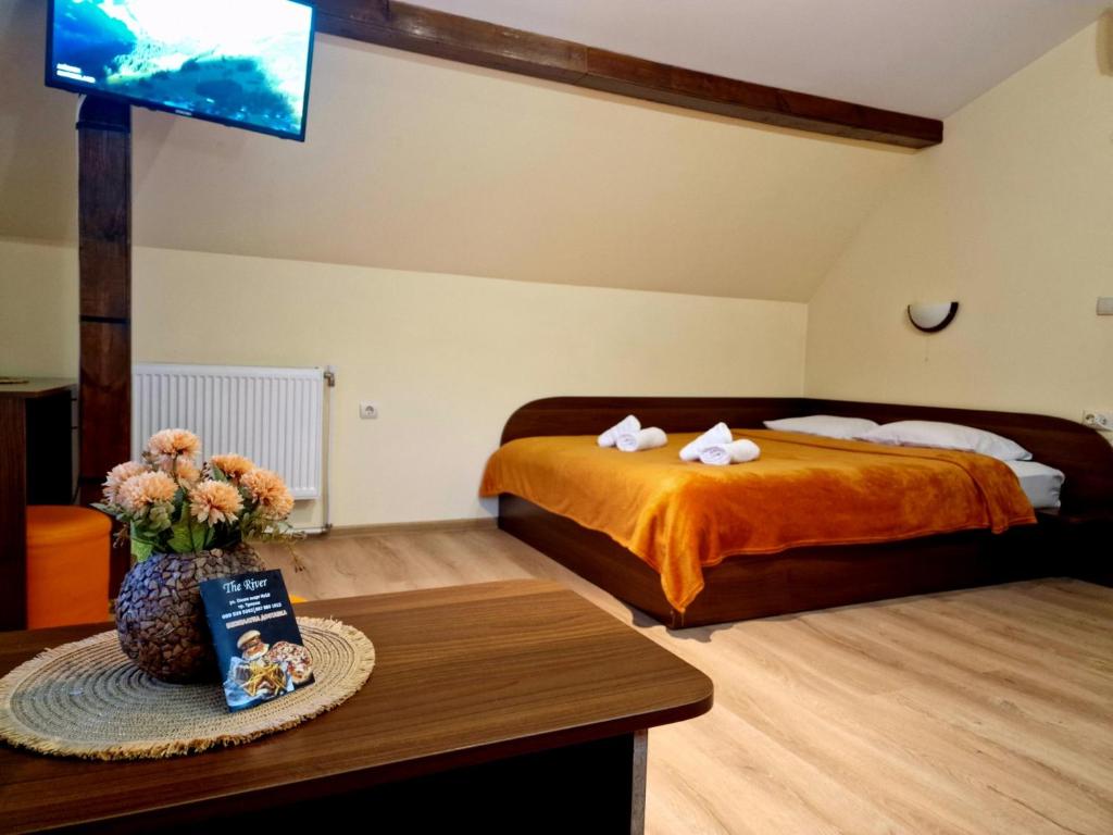 Postel nebo postele na pokoji v ubytování Rebeka Guest House