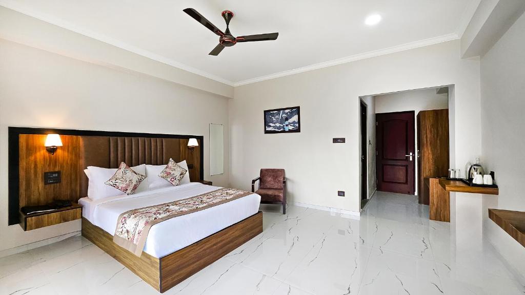 Postel nebo postele na pokoji v ubytování Yashshree Resorts & Spa Kalimpong