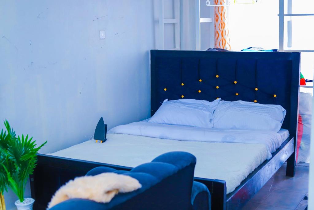 Postel nebo postele na pokoji v ubytování PK Homes
