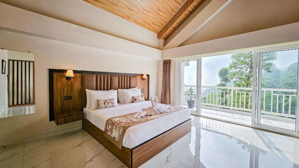 Postel nebo postele na pokoji v ubytování Yashshree Resorts & Spa Kalimpong