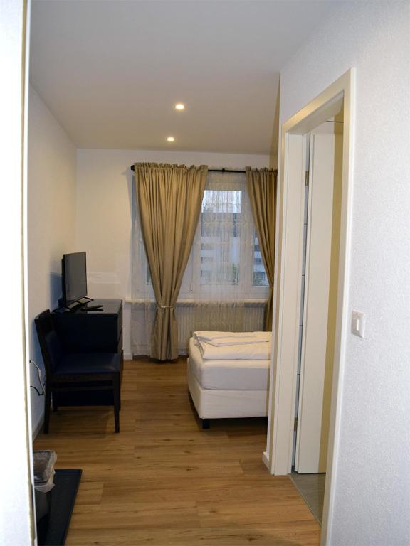 Postel nebo postele na pokoji v ubytování Hotel Restaurant Krebs