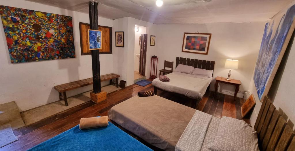 Postel nebo postele na pokoji v ubytování Marius B&B & Hostel