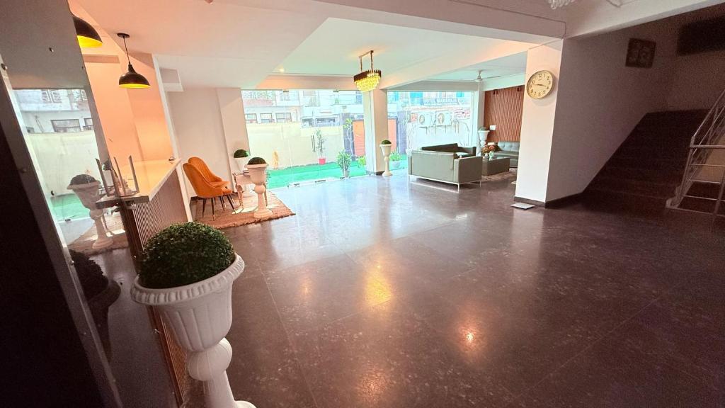 Posezení v ubytování Akshay corporate hotel