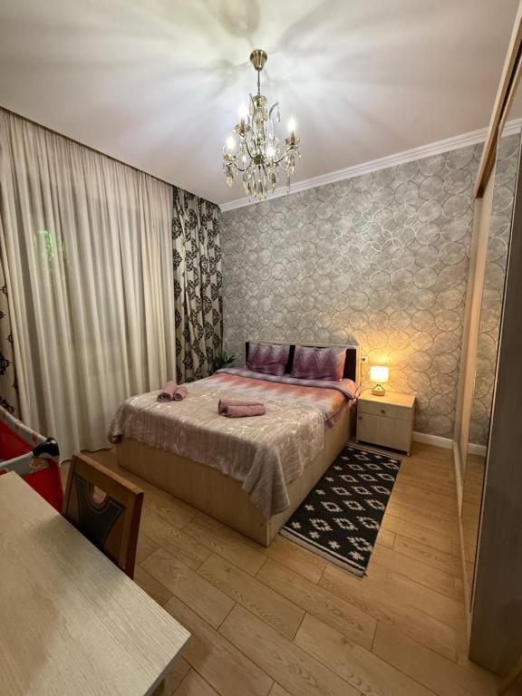 Postel nebo postele na pokoji v ubytování Old Tbilisi Apartments1