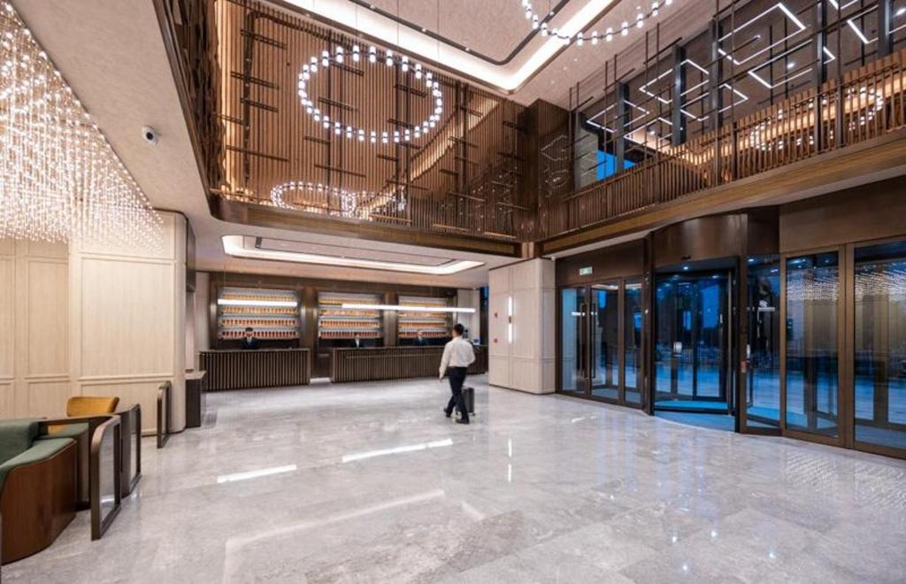 Vstupní hala nebo recepce v ubytování 西安高新区桔子水晶酒店
