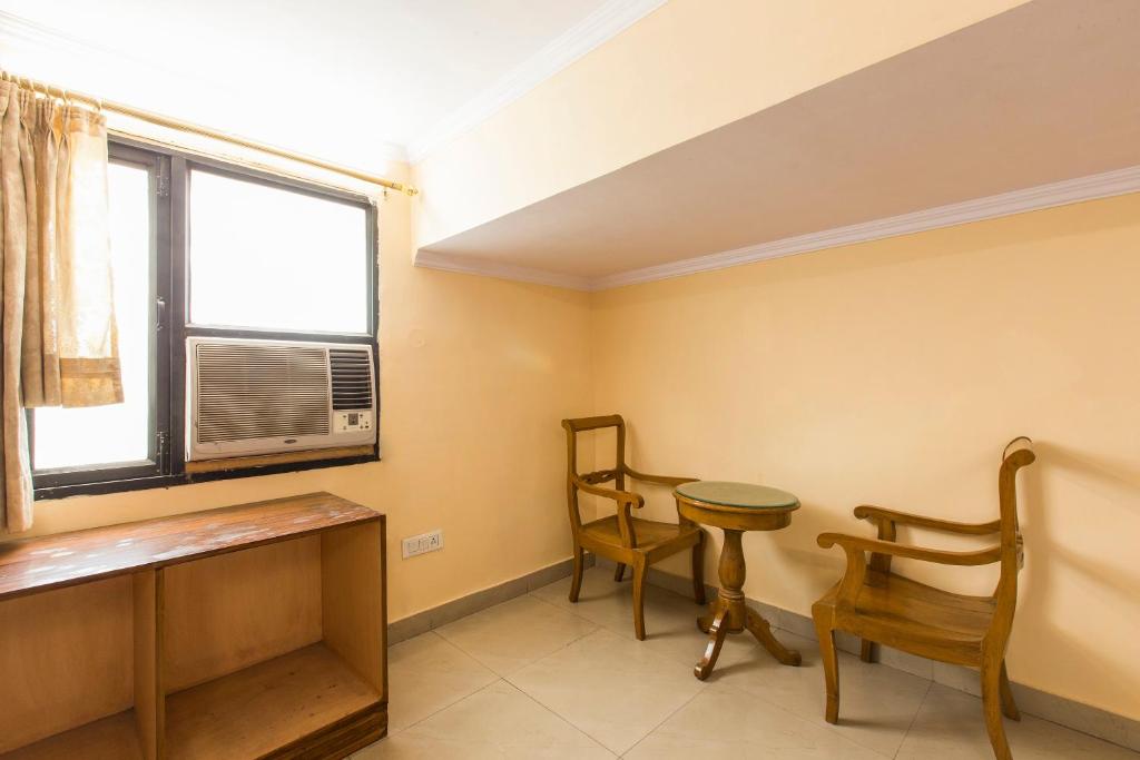 Kuchyň nebo kuchyňský kout v ubytování Hotel O Hotel Landmark Inn
