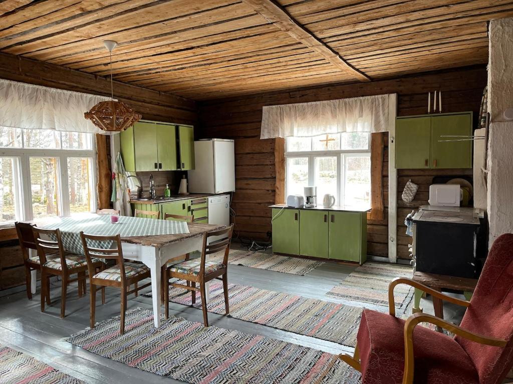 Kuchyň nebo kuchyňský kout v ubytování Vintage atmospheric log house