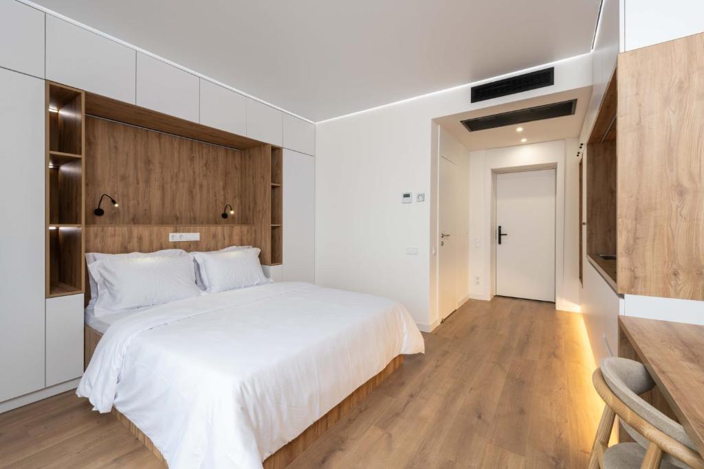 Postel nebo postele na pokoji v ubytování Lumen Living Apart