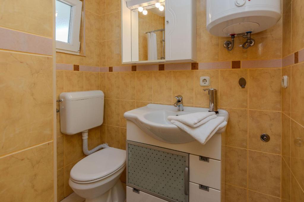 Kúpeľňa v ubytovaní Apartments Tukara